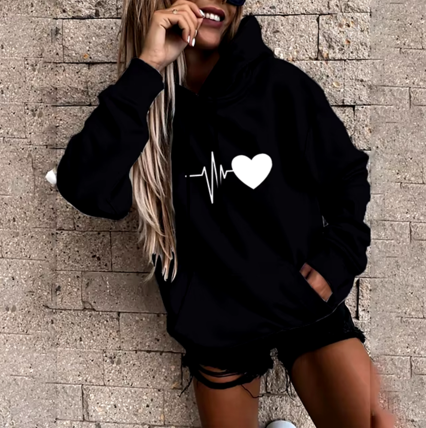 Rhian – Sudadera estampada con capucha