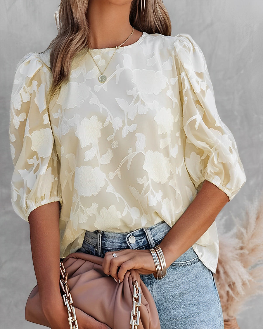 Maira - Elegante blusa floral con mangas abullonadas